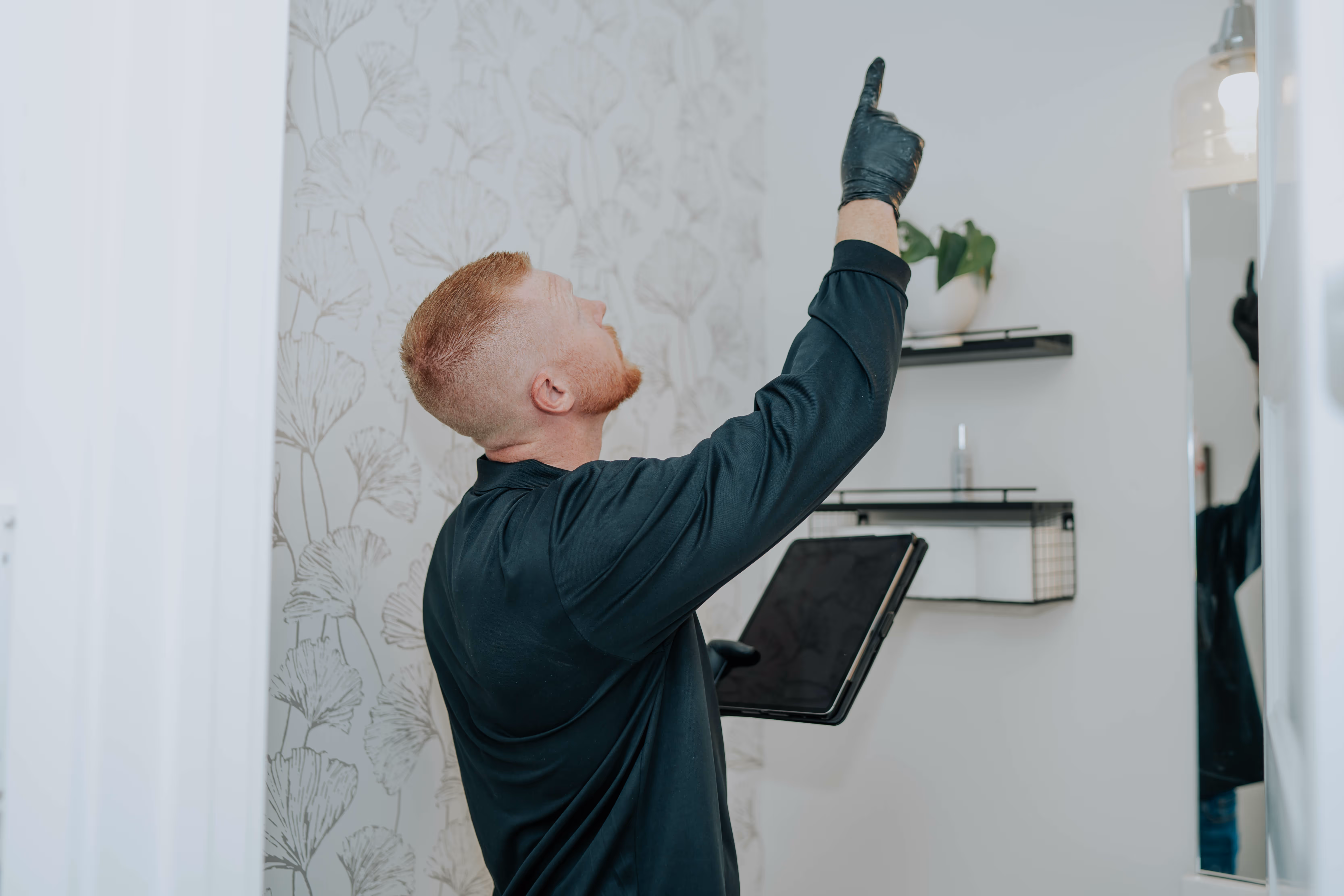 Technician inspecting a Westchester County property for mold and moisture